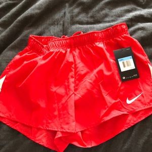 Women’s Nike Red shorts sz Medium NWT